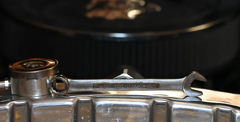 USA forged Craftsman 9/16 wrench on radiator.