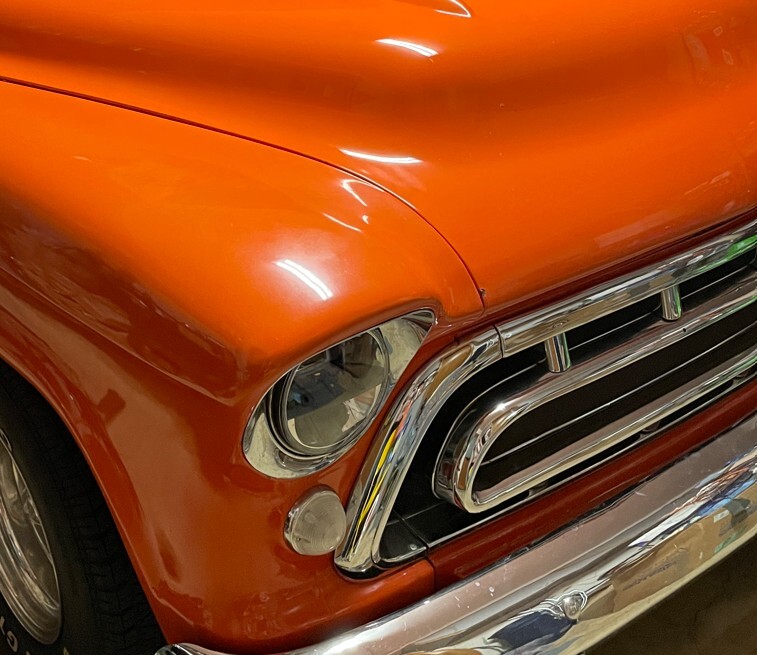 Front right grill and headlight 1957 Chevy pickup orange.